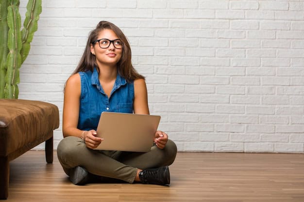 Portrait of young latin woman sitting on the floor looking up Premium Photo